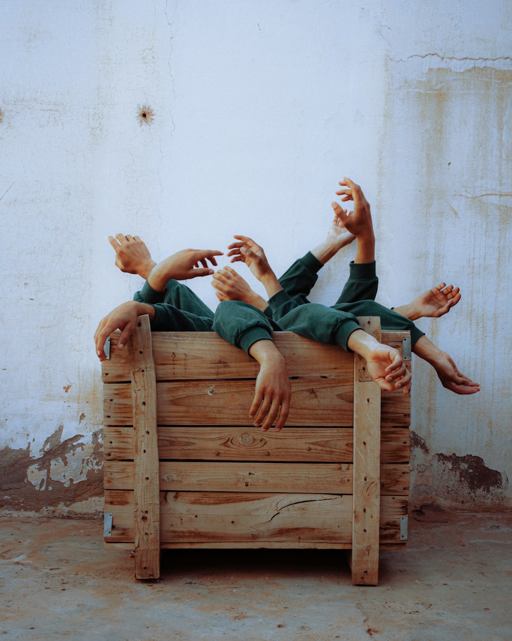 2 men sitting on brown wooden bench