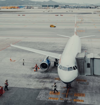 people walking on airport during daytime