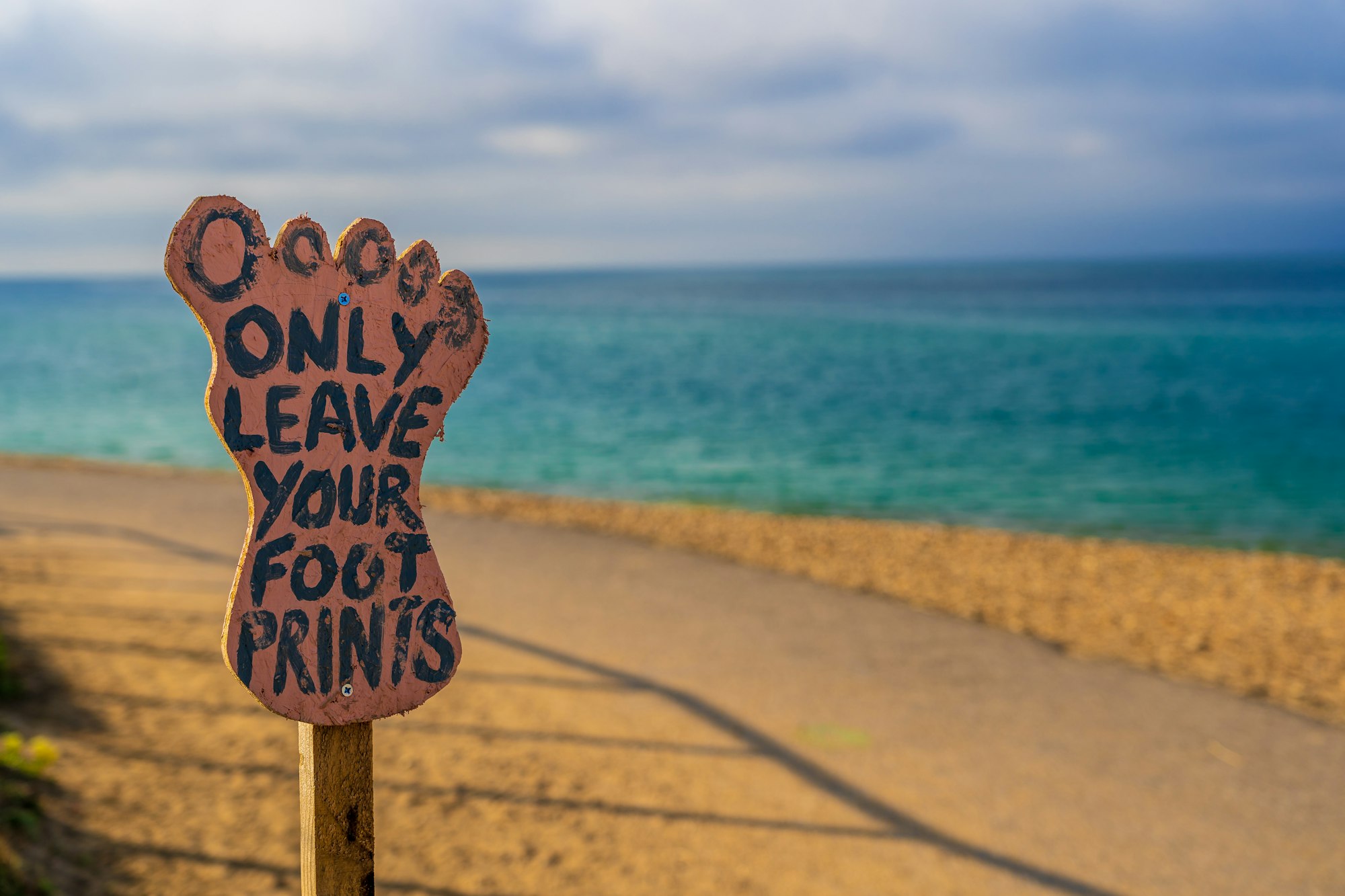 A great sign just before you get to the beach at Hengistbury Head, Dorset, reminding people to take home all their rubbish with them.