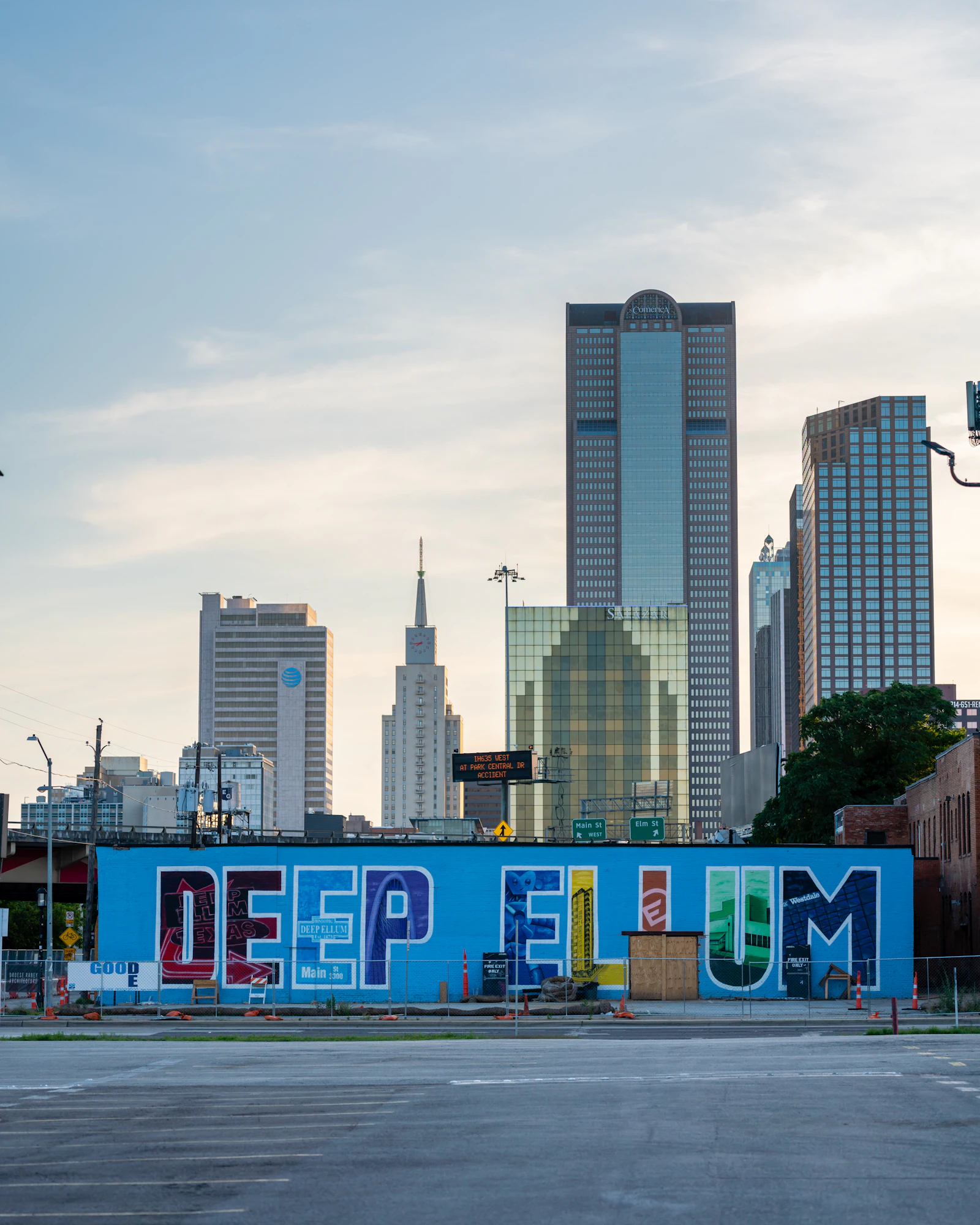 Deep Ellum mural with the Dallas skyline in the background, Texas