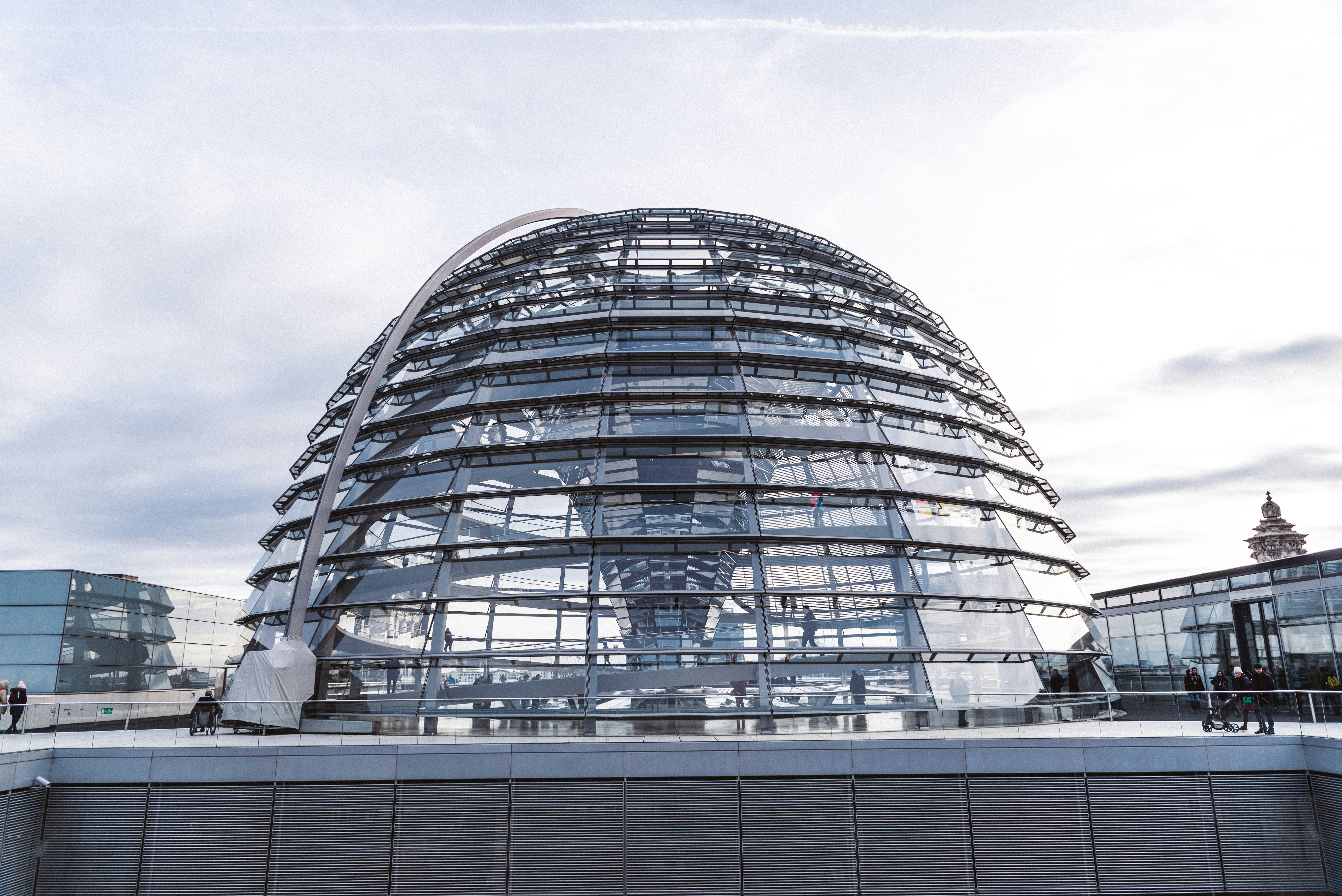 glass building under cloudy sky during daytime