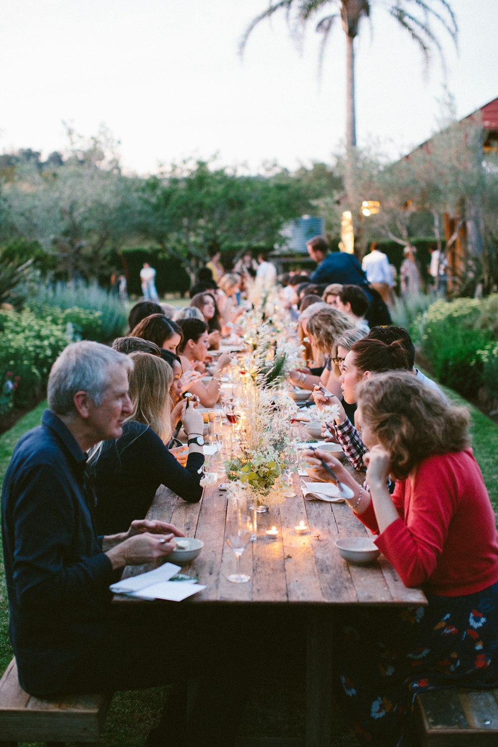 people sitting on chair in front of table during daytime