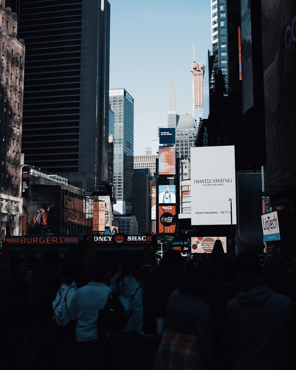 people walking on street during daytime