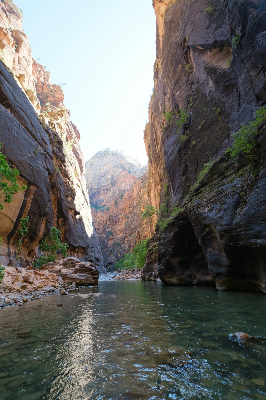 river between rocky mountains during daytime