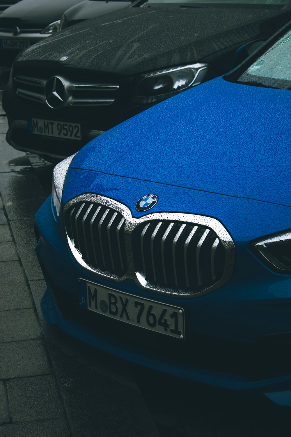 blue bmw car on road