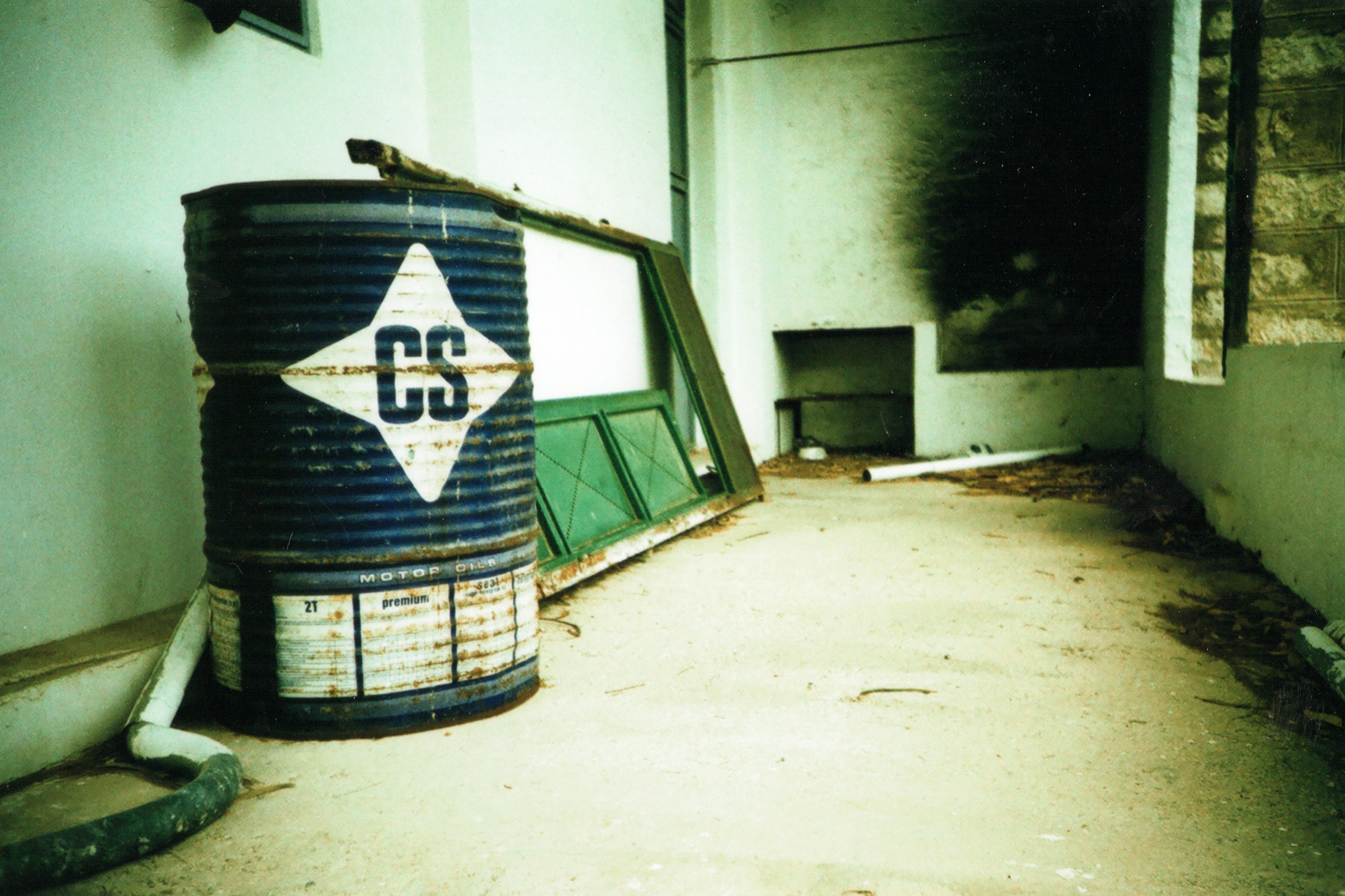 blue and white wooden trash bin