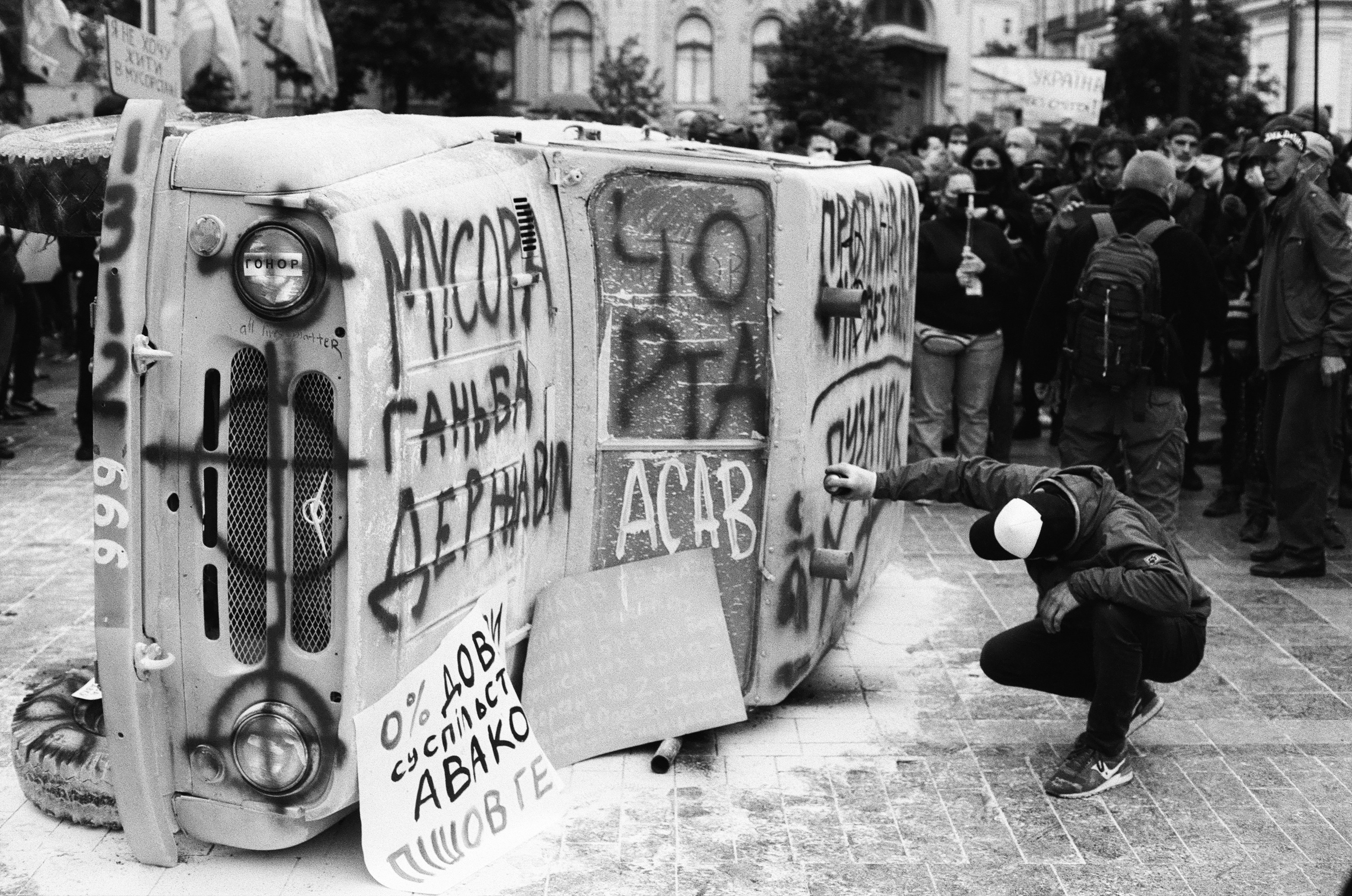 grayscale photo of white and black bus
