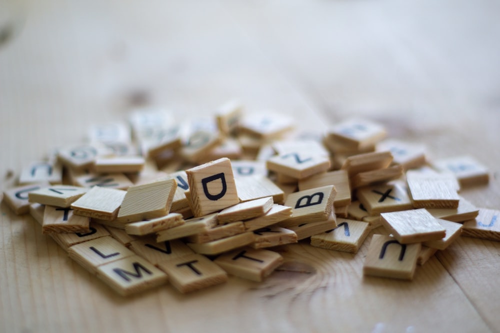 brown wooden blocks on brown wooden table