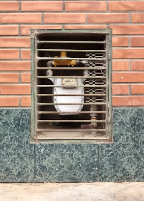 brown wooden framed glass window
