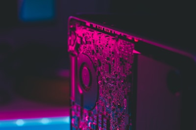 red and black card on brown wooden table