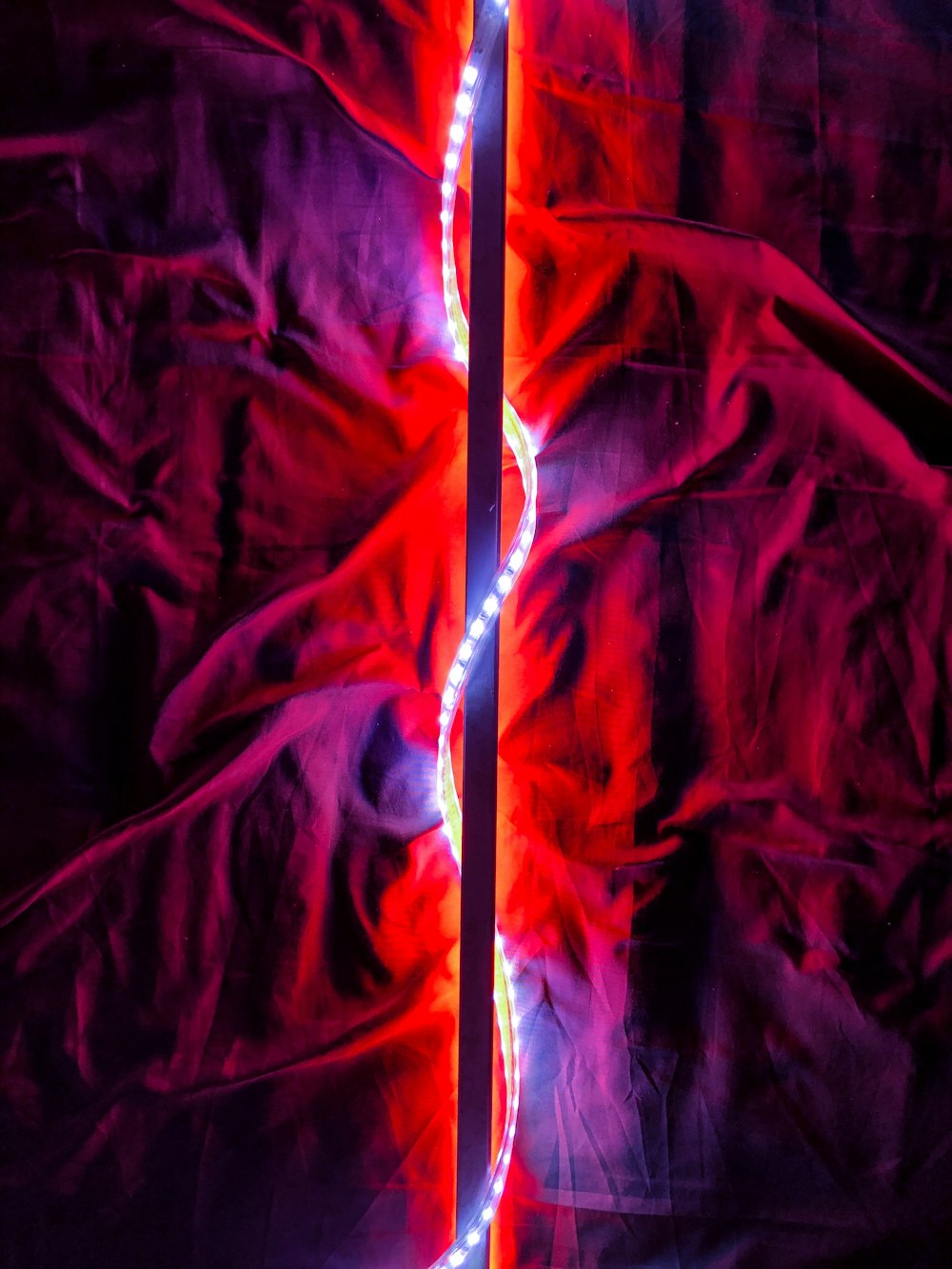 red and white textile on brown wooden table