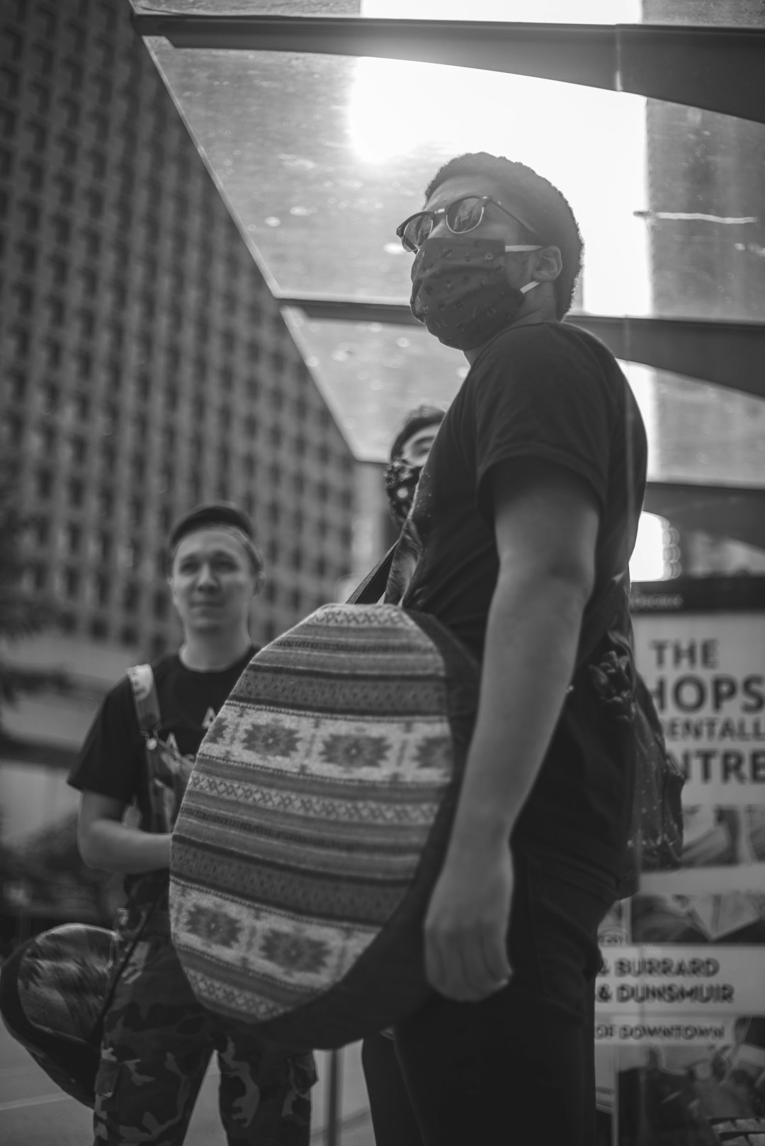 man in black t-shirt and backpack