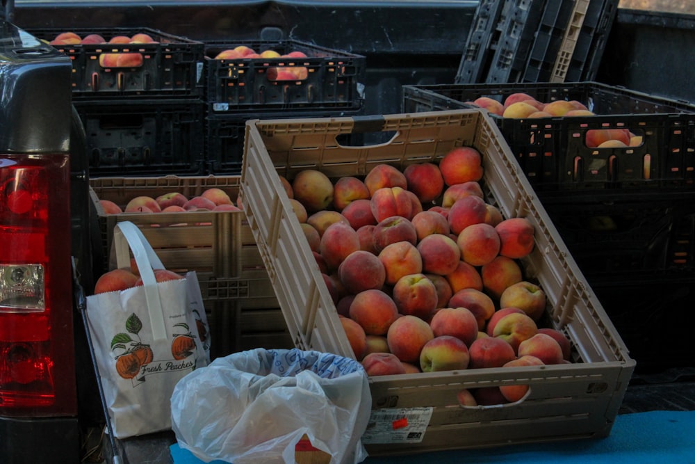 red apples on brown wooden crate