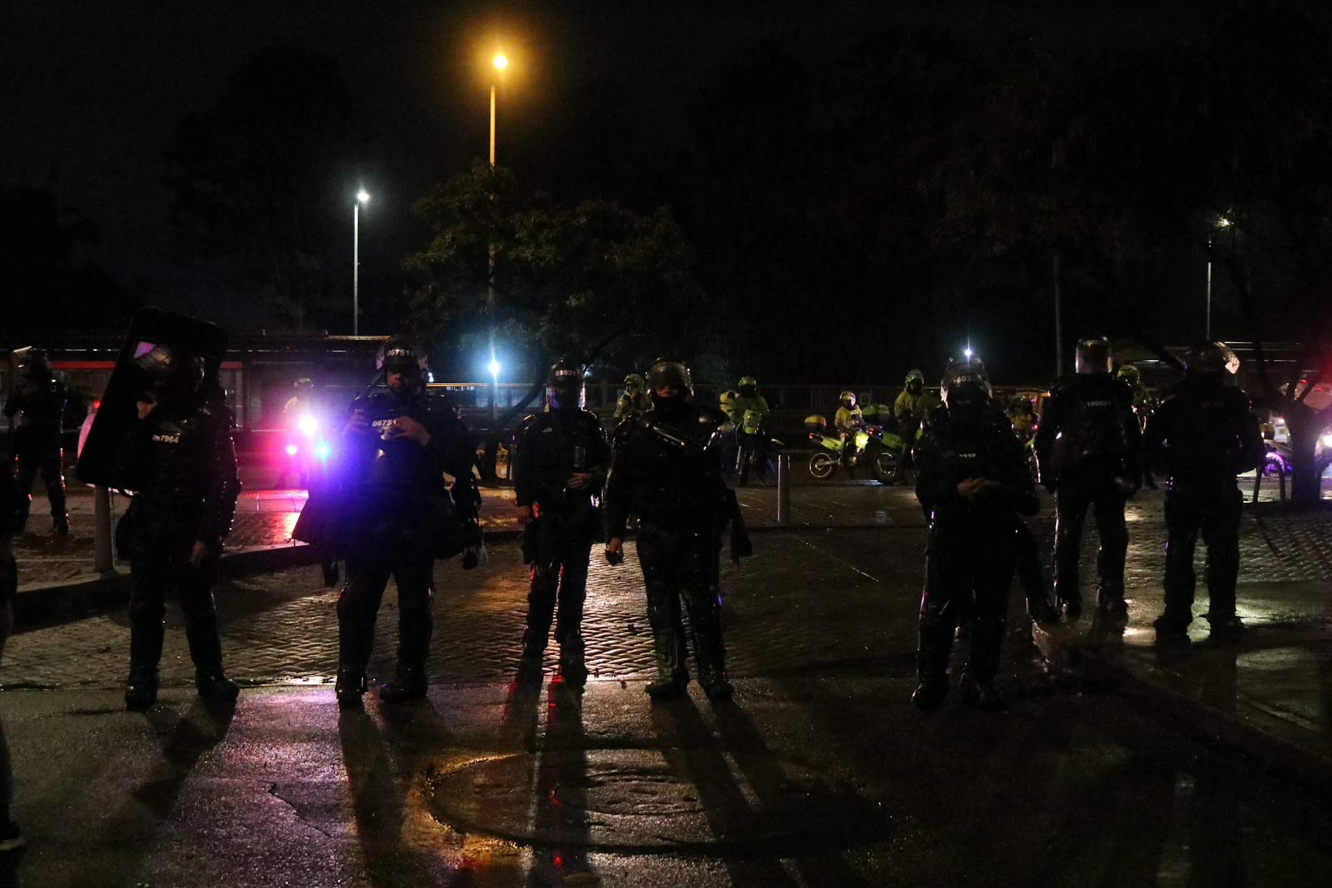 woman wearing yellow long-sleeved dress under white clouds and blue sky during daytime