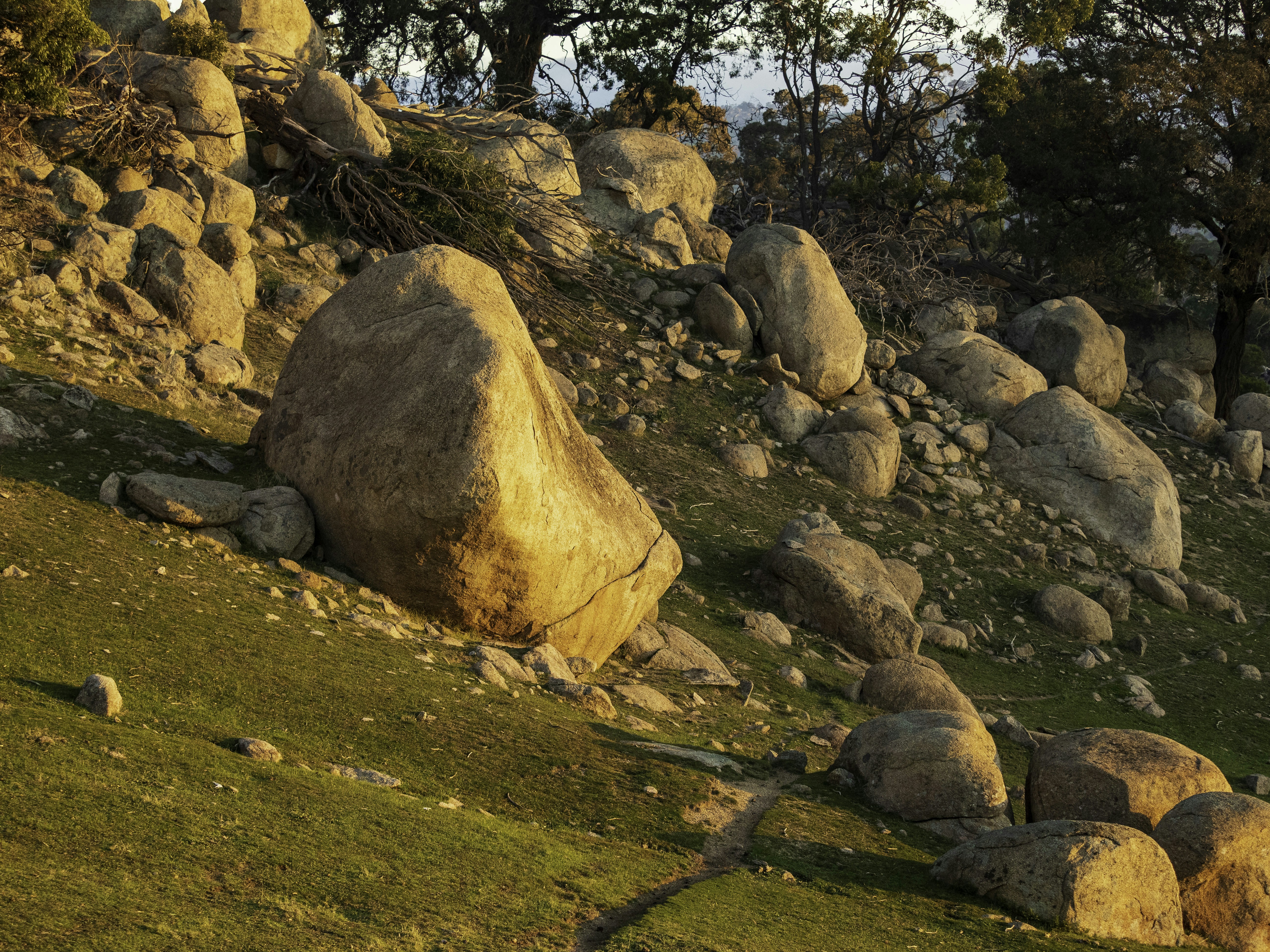 Ancient granite boulders balanced in Matobo Hills at golden hour