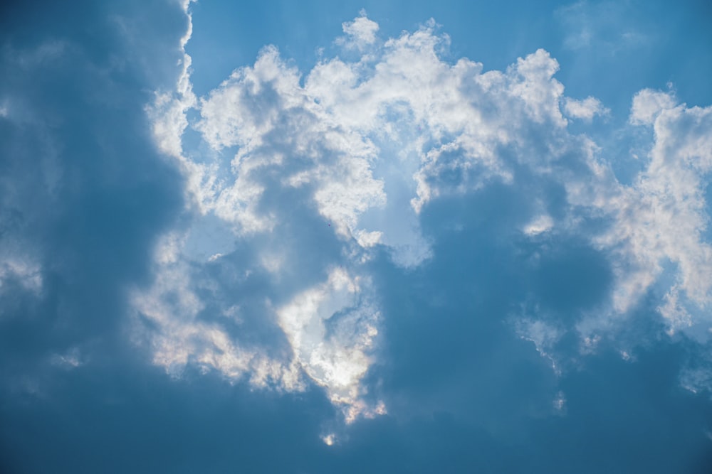 white clouds on blue sky