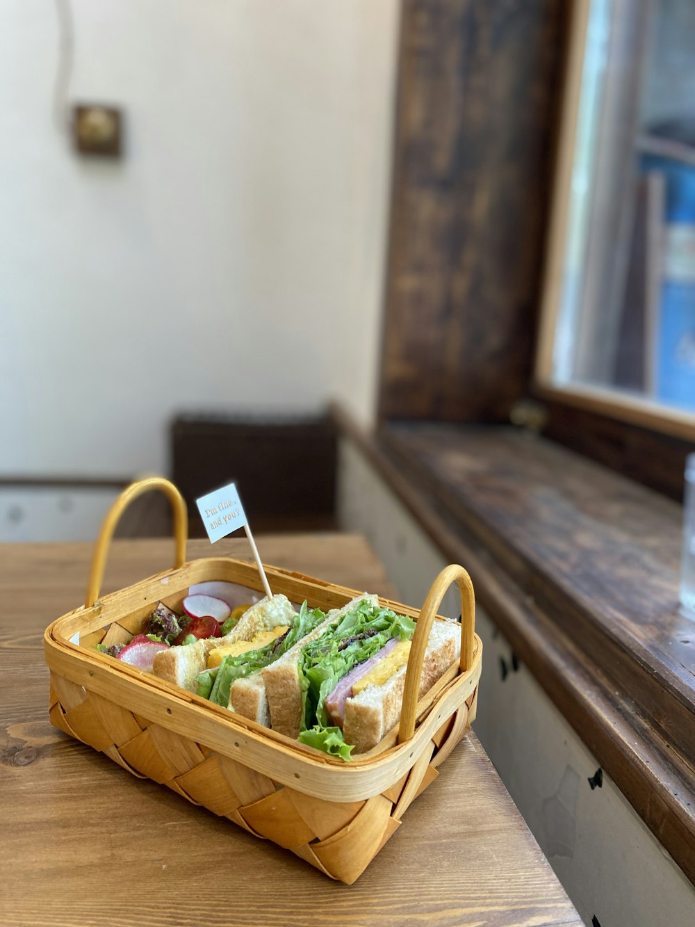 brown wooden tray with food on brown wooden table