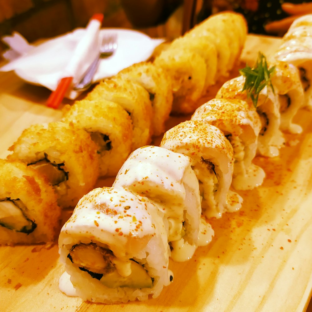 fried food on brown wooden chopping board