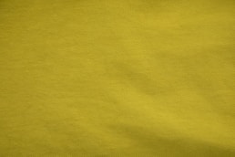 yellow textile in close up photography