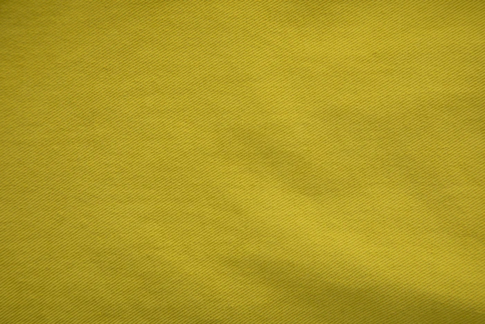 Textura de tela amarilla de cerca