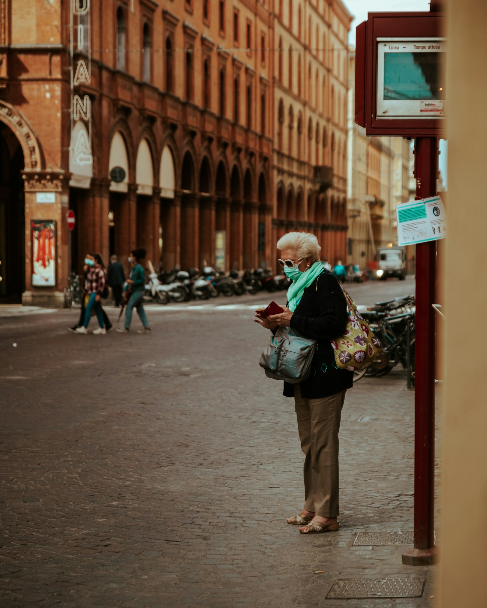 Canon 24.0-70.0 mm sample photo. Woman in green jacket photography