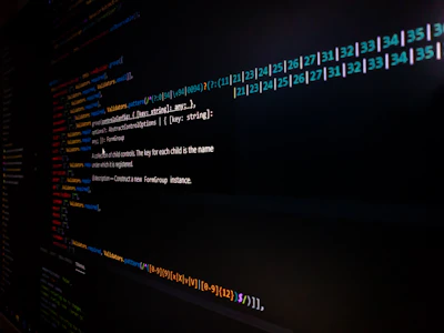 Screens displaying lines of code alongside project preview images.