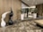 A modern indoor setting with a polished marble floor and a decorative area featuring white and black abstract sculptures. Tall white planters with green plants add a natural touch. The background includes a stylish grid-like wall design providing texture and depth.