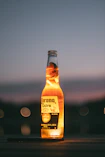 selective focus photography of corona extra bottle
