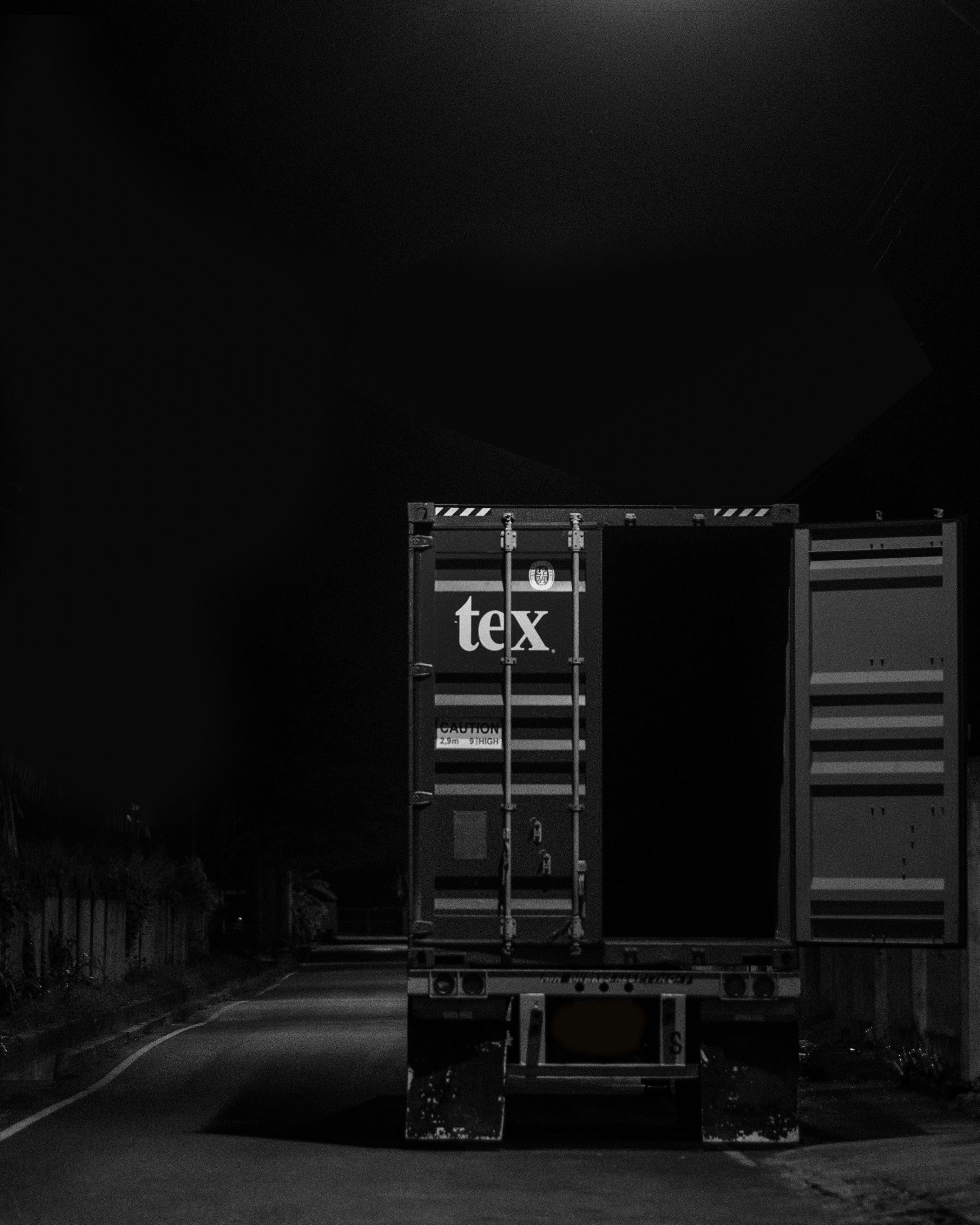 Night scene with an empty shipping container.