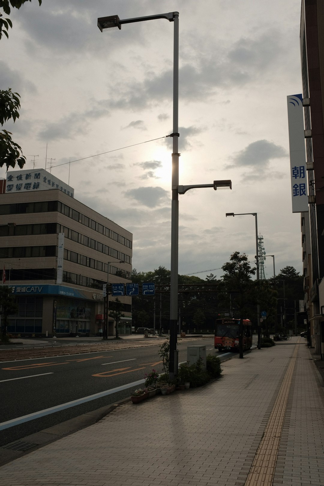 white and brown concrete building near road during daytime