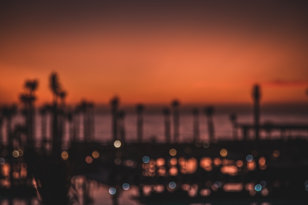 silhouette of city buildings during sunset