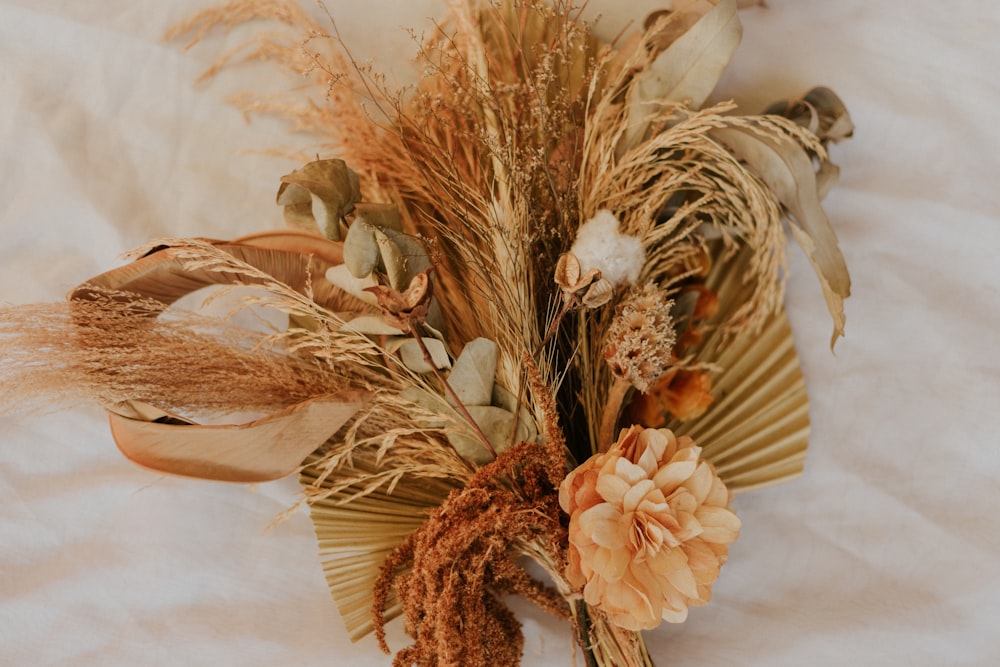 white and brown flower bouquet