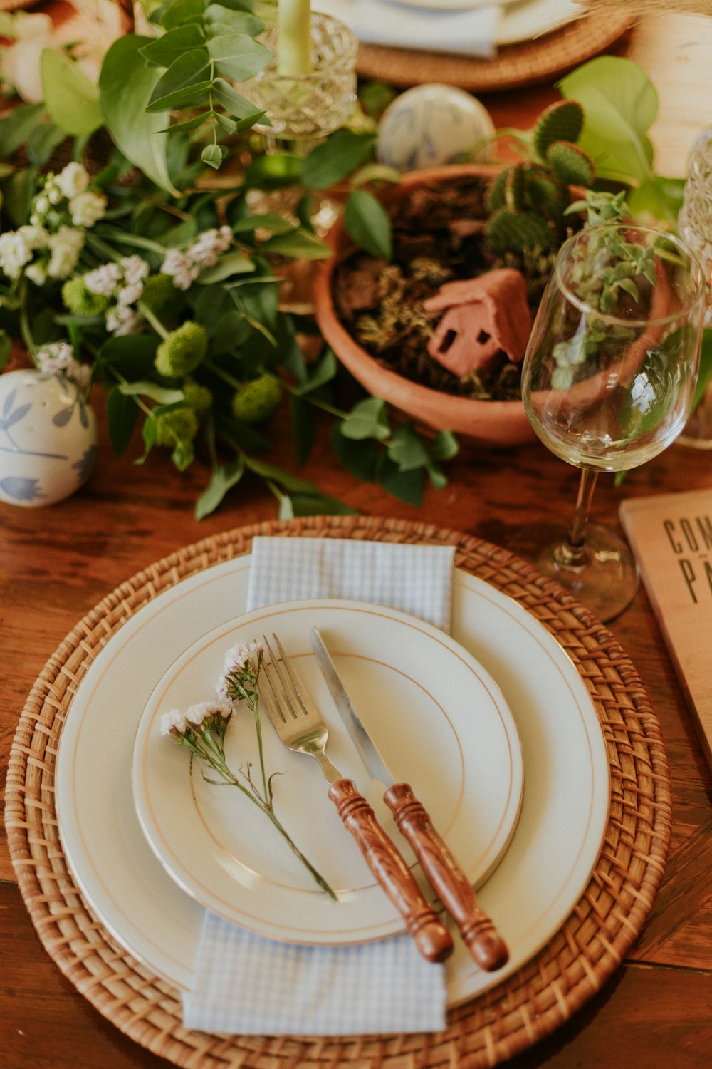 stainless steel fork and knife on white ceramic round plate