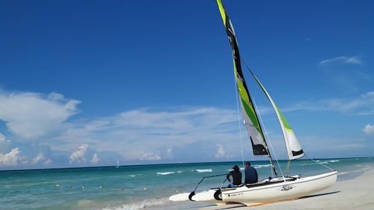 white and black boat on sea during daytime in Varadero Cuba