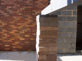brown brick wall during daytime