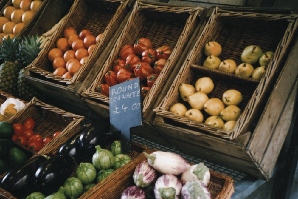 assorted fruits on brown wooden crate