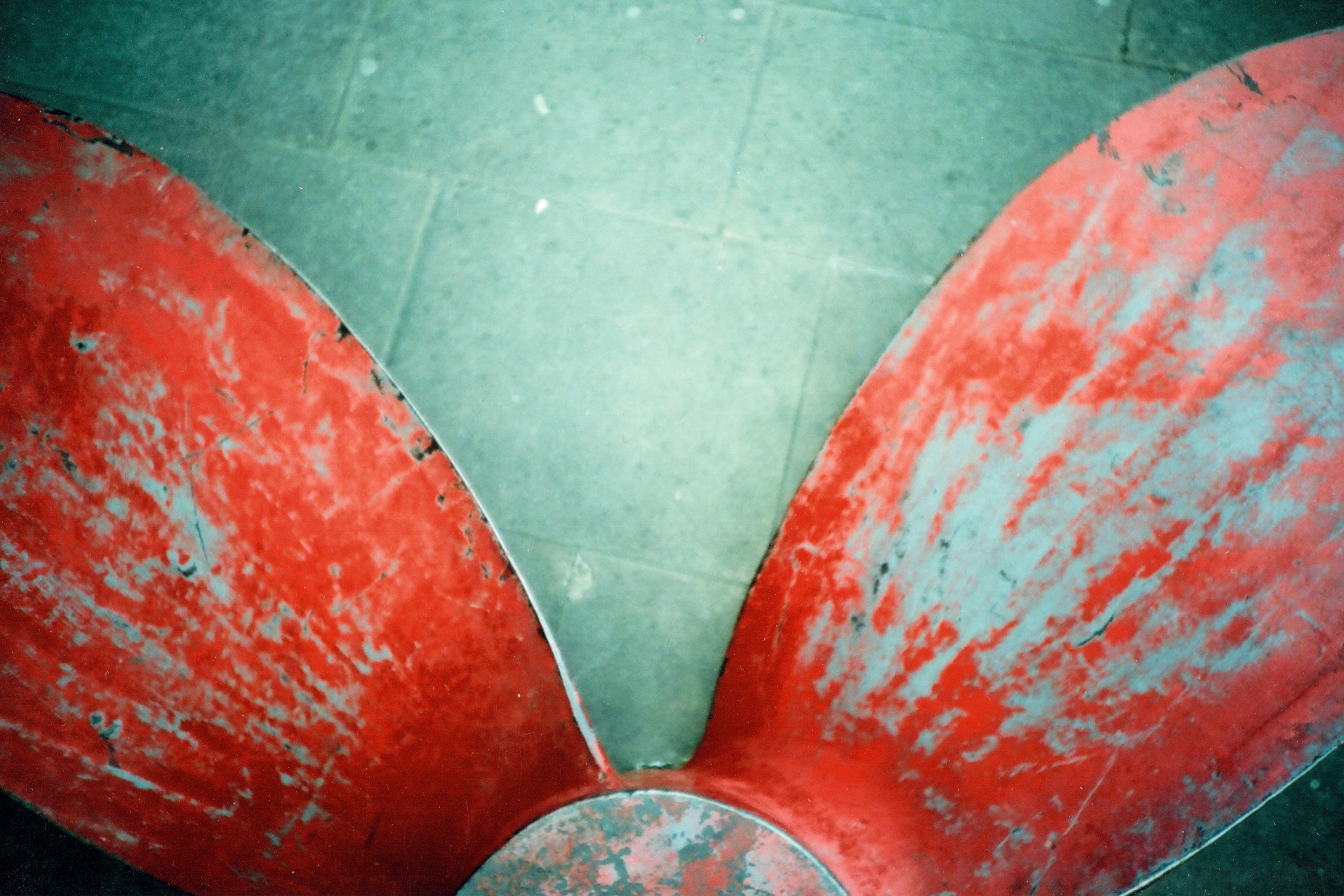 red and silver chair on gray floor tiles