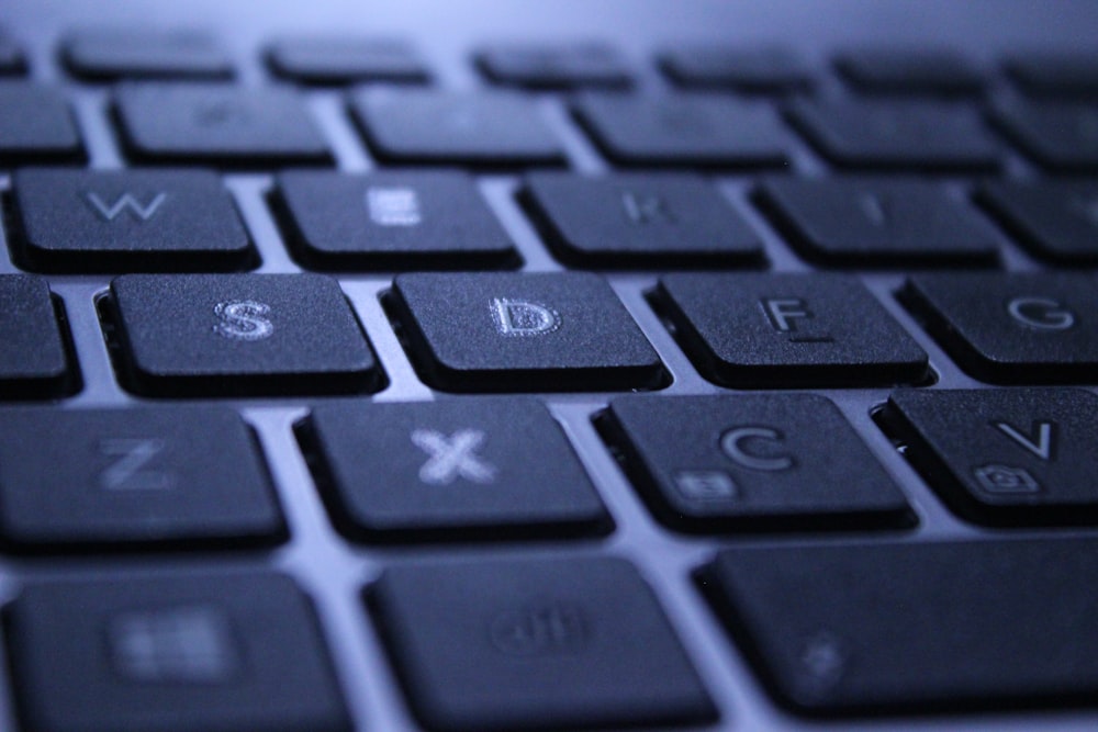 black and silver laptop computer