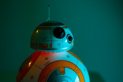 Close-up of the robot’s advanced sensor module glowing softly in yellow accents