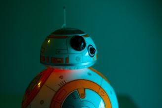 Close-up of the robot’s advanced sensor module glowing softly in yellow accents