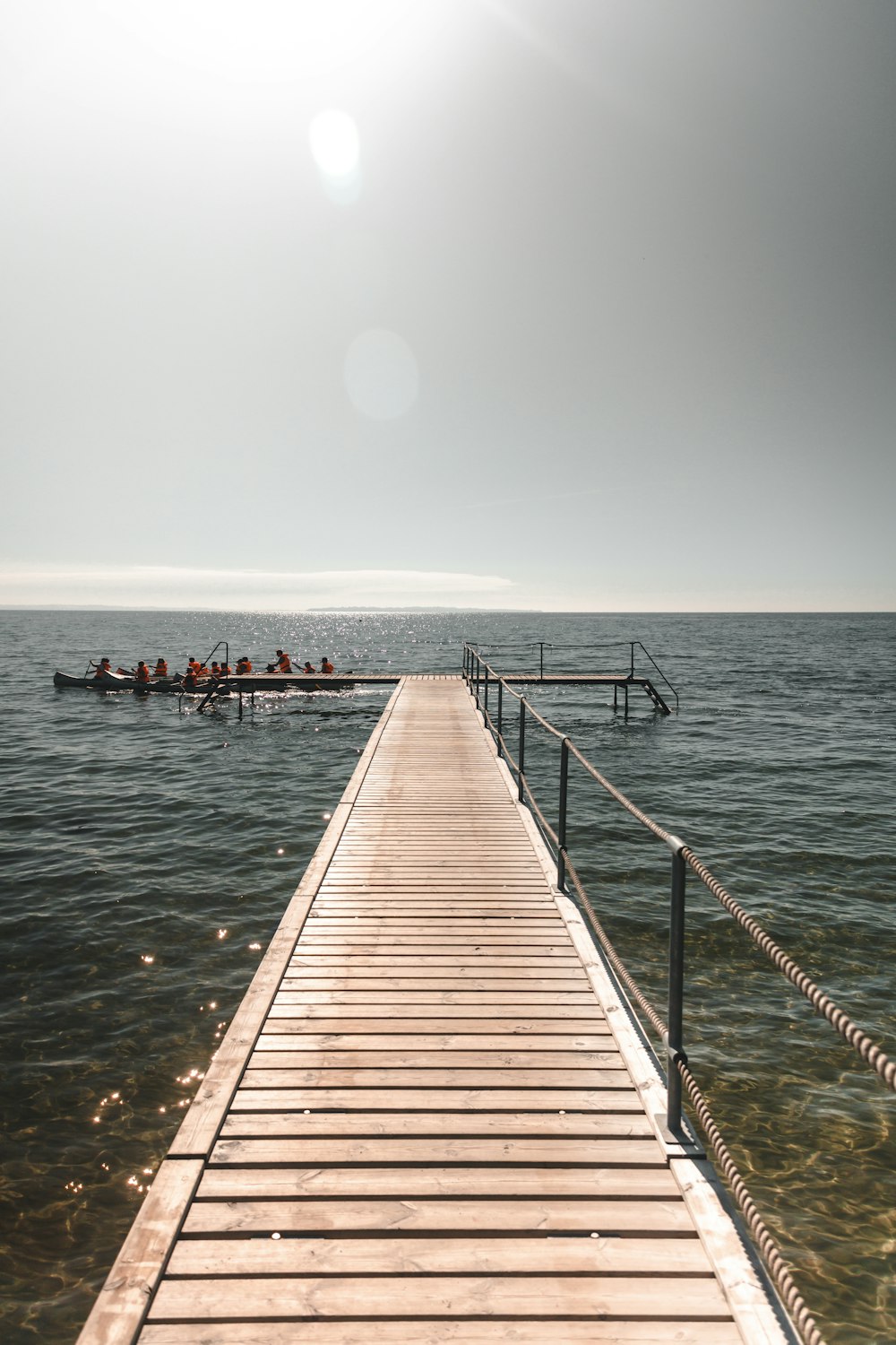 brown wooden dock on sea during daytime