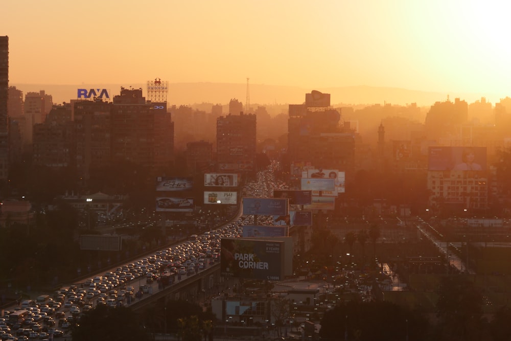 city skyline during orange sunset