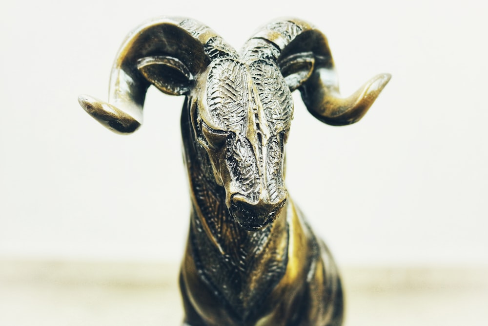 black and gold animal figurine