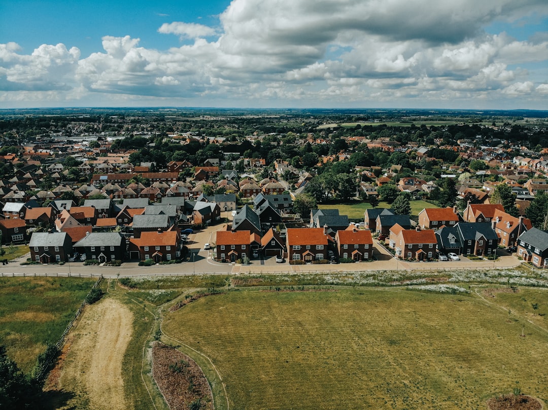 brown and white houses under blue sky during daytime