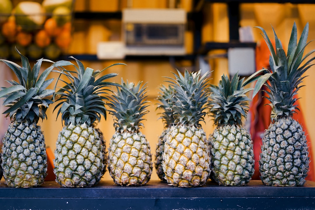 green pineapple fruit on table