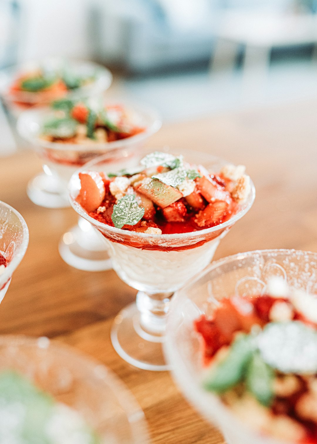 sliced strawberries in clear glass bowl