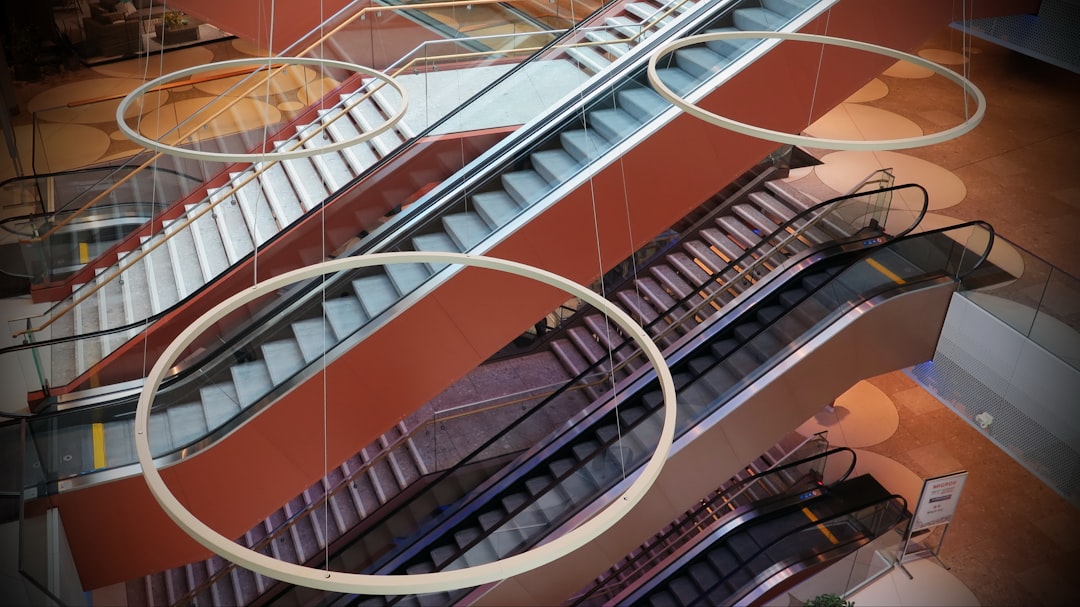 white and brown spiral staircase