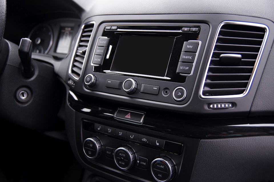 Stock image of a car audio system representing website design for car stereo and security shops by Cannone Marketing