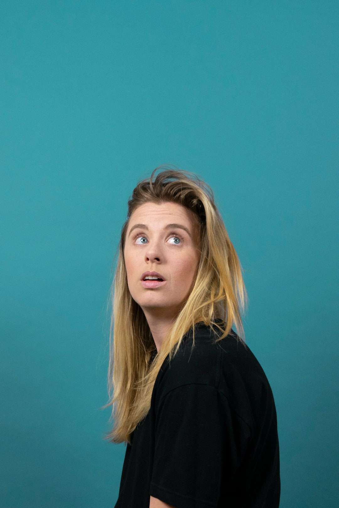 woman in black shirt standing