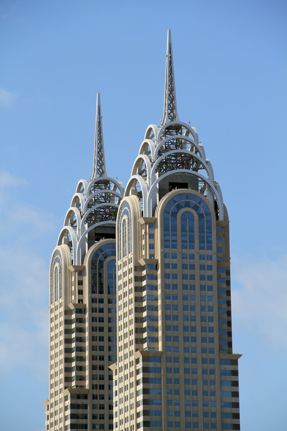 brown concrete building under blue sky during daytime